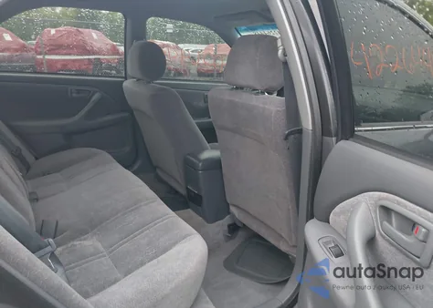 1999 Toyota Camry Le from USA, damaged, VIN 4T1BG22K4XU566174